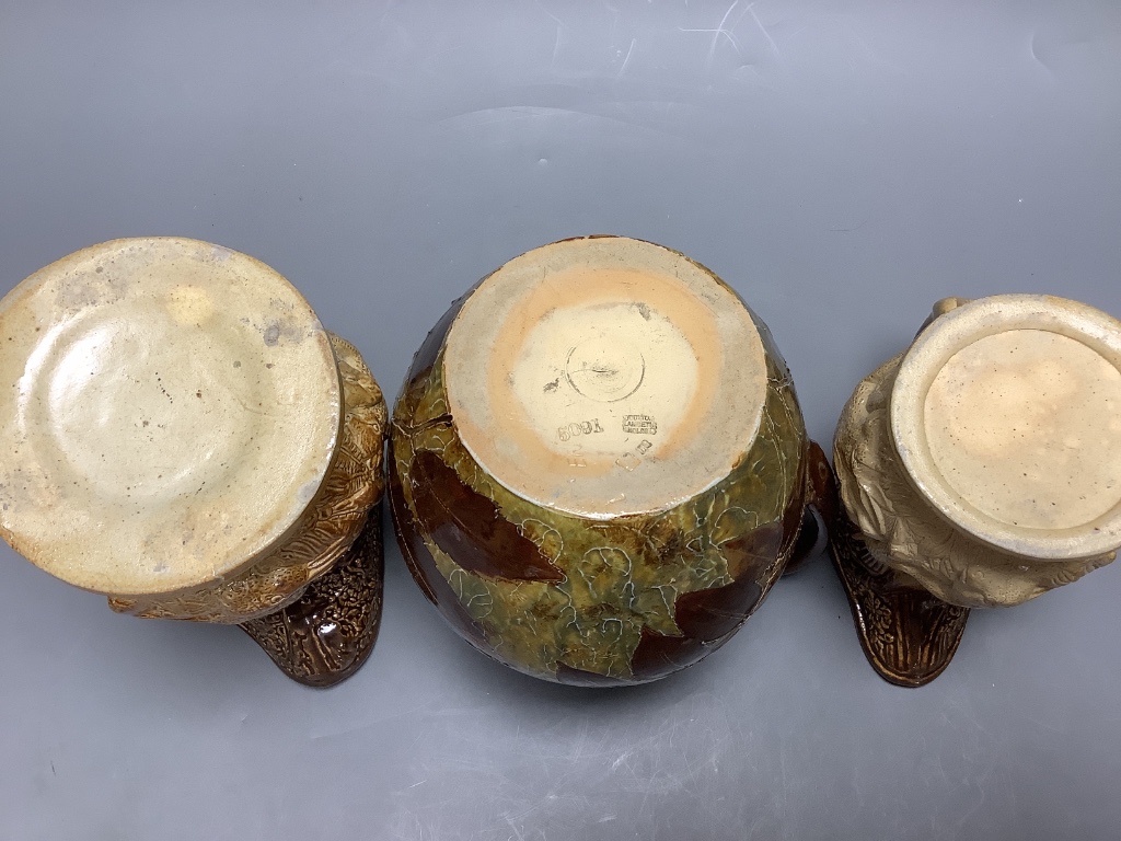 Two 19th century hunting related stoneware jugs and a Doulton Lambeth Autumn leaves stoneware jug, tallest 21cm